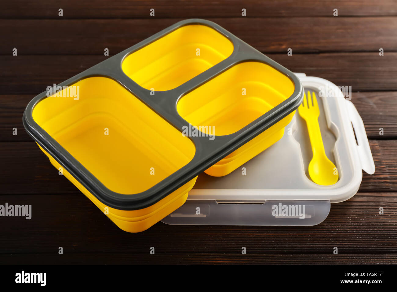 Empty school lunch box on wooden background Stock Photo