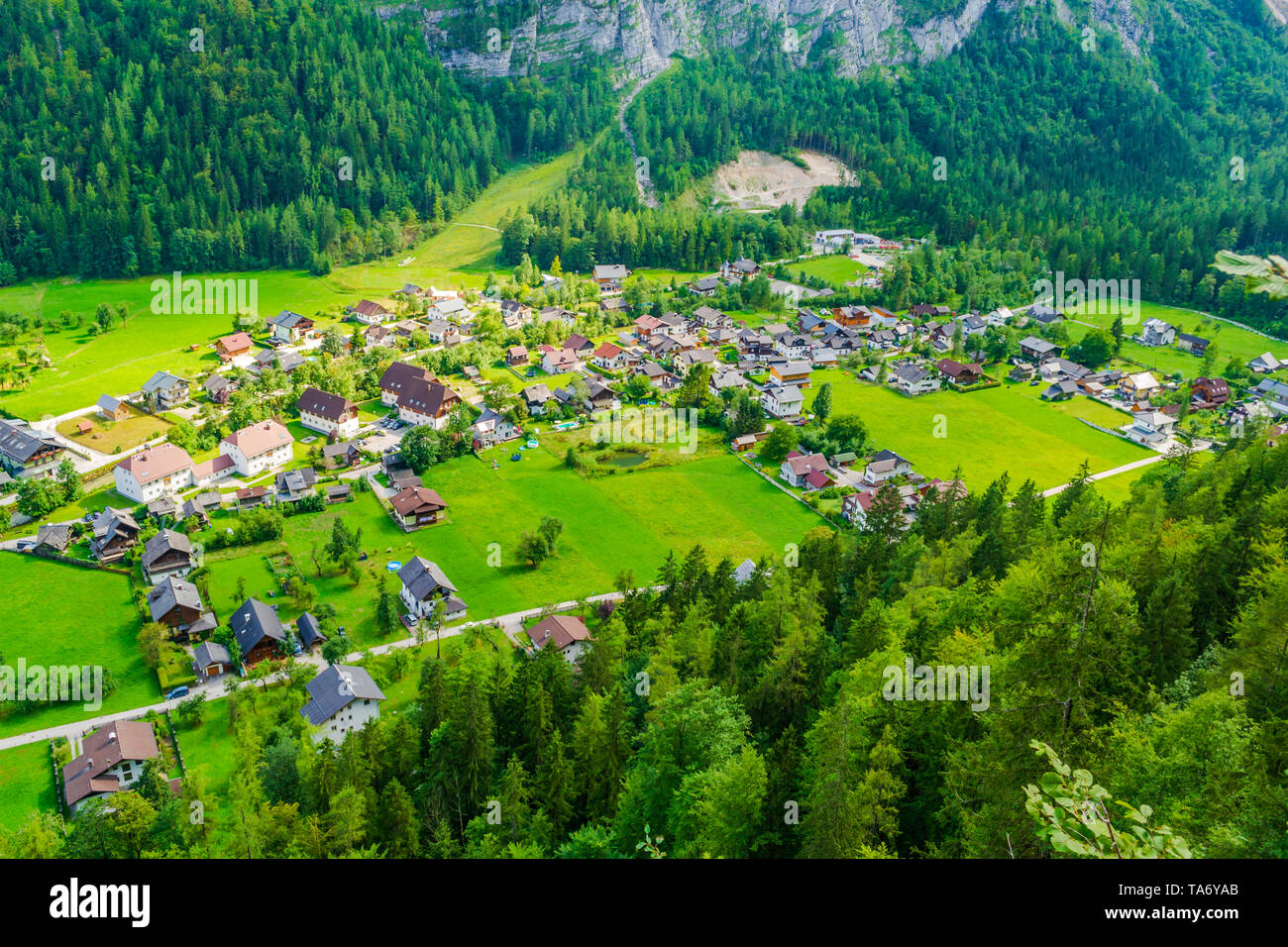 Aerial view of Hallstatt village with tiny houses, as seen from the difficult (rated black) Echernwand klettersteig/via ferrata route on a sunny day i Stock Photo