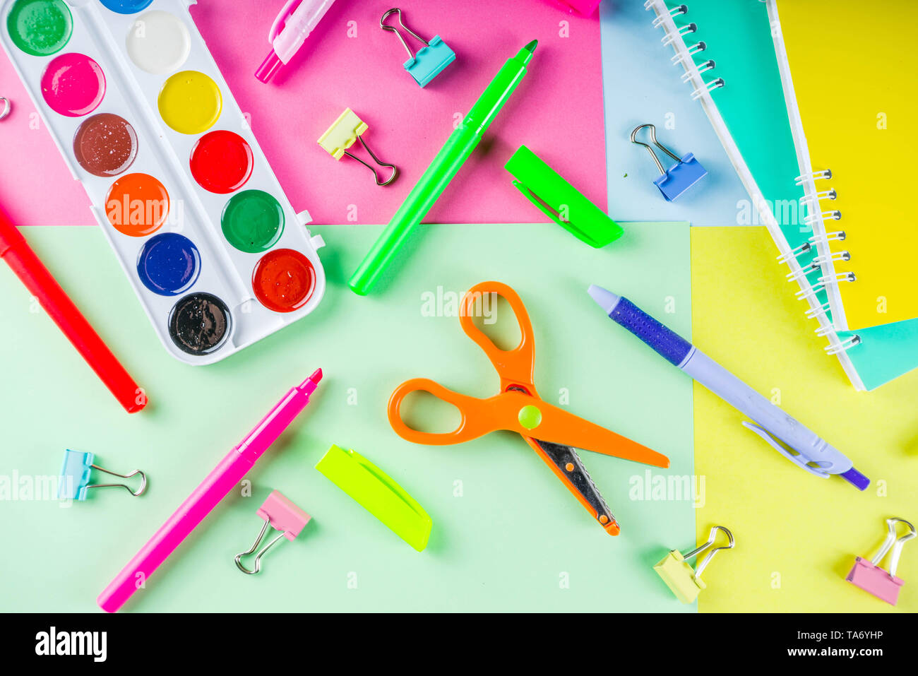 Colorful back to school background. Bright background with school supplies, stationery, pens, pencils, rulers, notebooks, copy space for text, whitebo Stock Photo