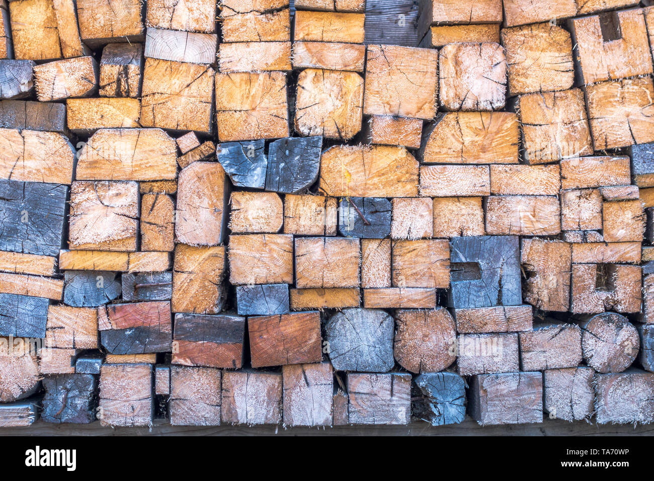 Firewood Cut And Stacked Neatly In Pile Outside Ready For Use In