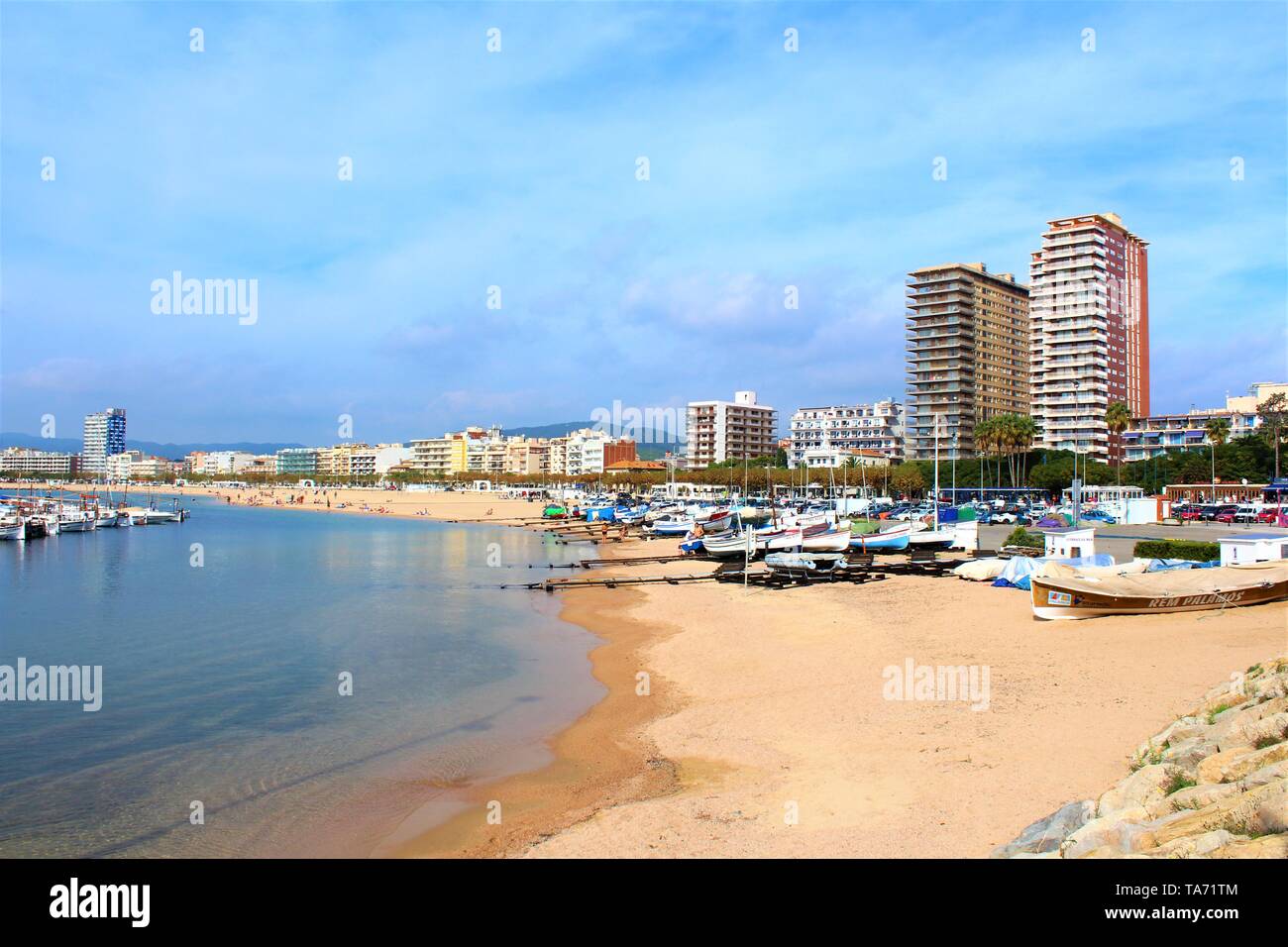 Palamos, Costa Brava, Spain: Tourists and locals enjoying the coastline of the small fishing town of Palamos. Stock Photo