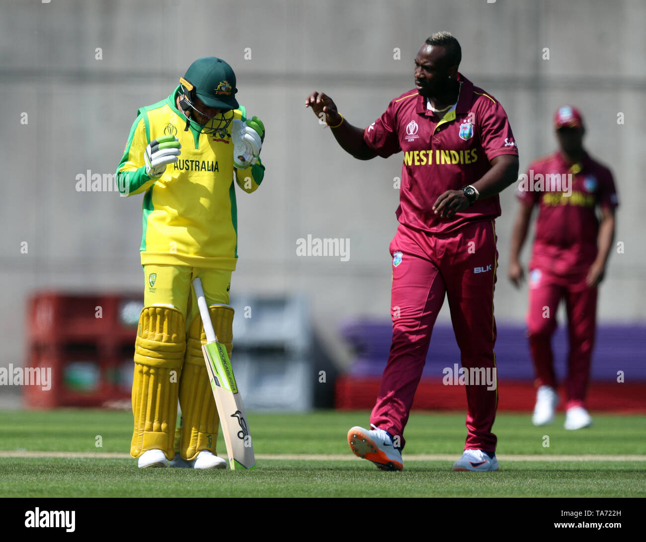 West Indies Andre Russell (right) checks on Australias Usman Khawaja (left) after hitting him on the head with a bouncer during the World Cup warm-up match at the Nursery Ground, Southampton Stock