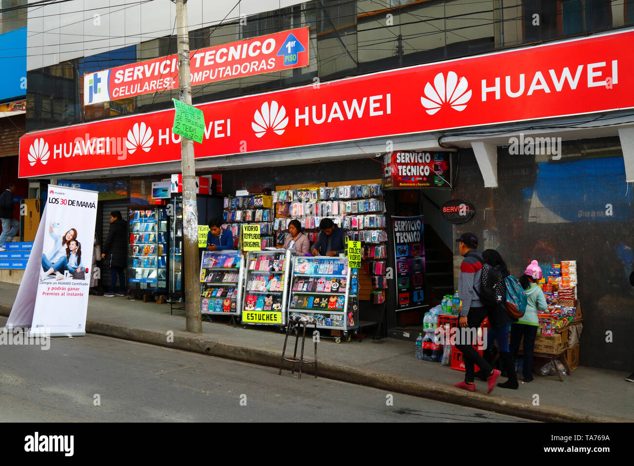 Kiosks selling mobile phones outside a Huawei shop in contraband electionics market area, La Paz, Bolivia Stock Photo