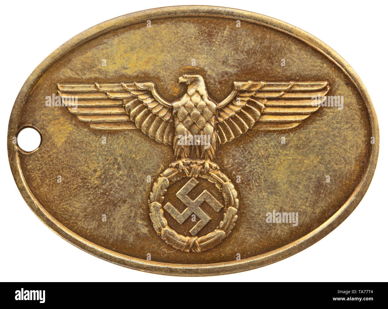 An identification badge of the national criminal police Bronze and non-ferrous metal, with national eagle embossed on the front. The reverse with embossed inscription 'STAATLICHE KRIMINALPOLIZEI' (tr. 'national criminal police') and struck number '3417' above a raised line. Dimensions circa 51 x 37.2 mm. Weight 29.6 g. Comes with a blueprint concerning retirement issued to a detective chief constable. historic, historical, 20th century, Additional-Rights-Clearance-Info-Not-Available Stock Photo