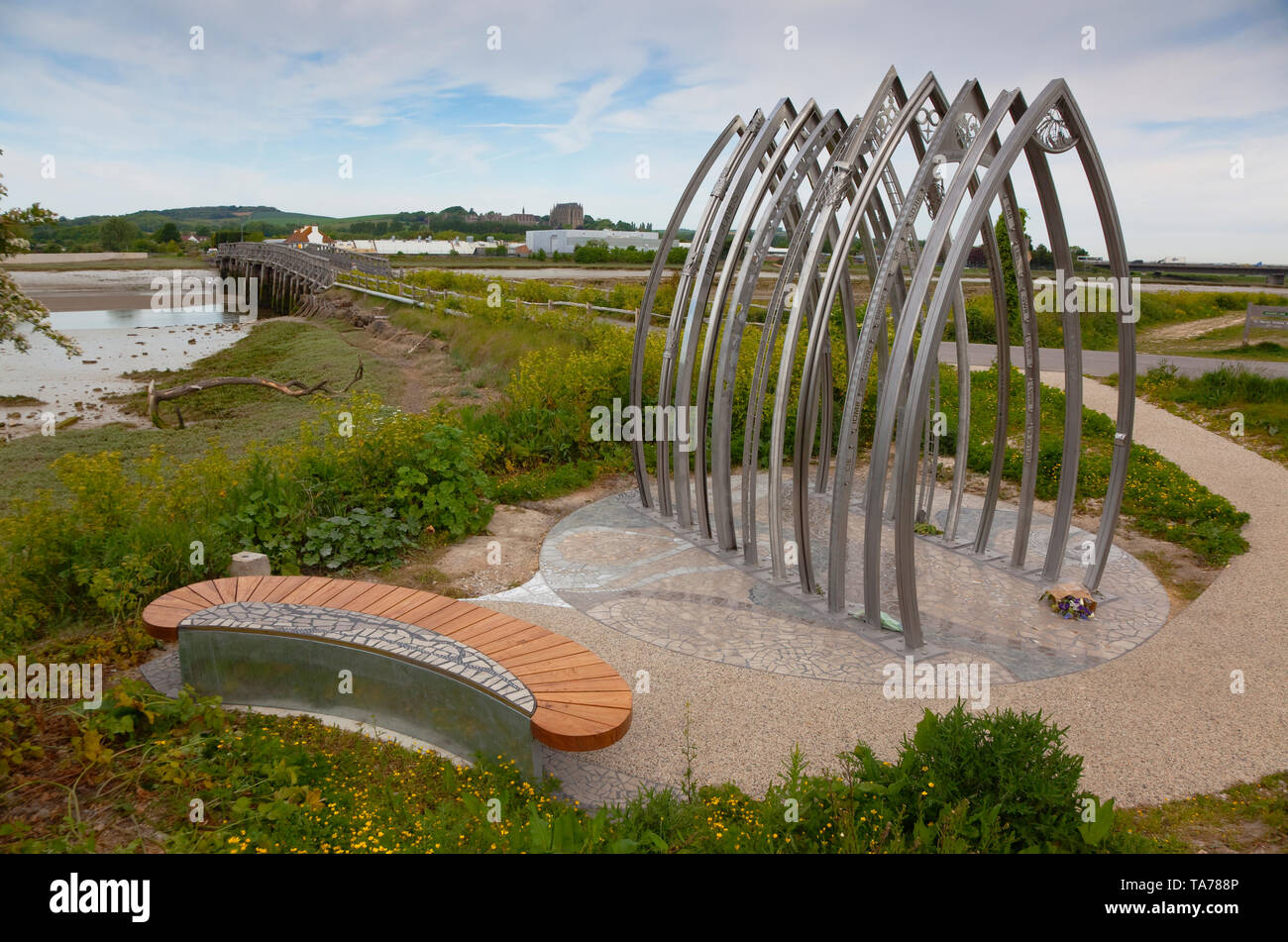 England, West Sussex, Shoreham-by-Sea, Air crash memorial sculpture by artists Jane Fordham and David Parfitt and positioned on the bank of the river Adur by the footbridge to the airport. Stock Photo