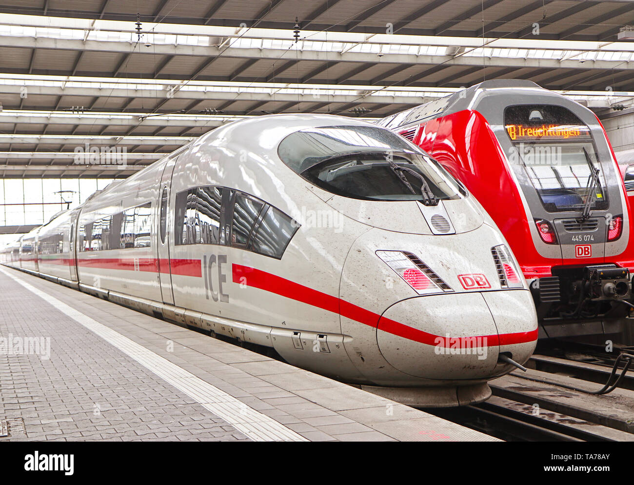 MUNICH, GERMANY -  Munich central station departure and arrival hall, ICE Intercity-express train ready at the platform Stock Photo