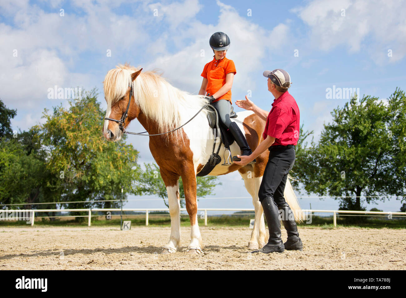 Icelandic Horse. A riding instructor gives a girl lessons. Austria Stock Photo