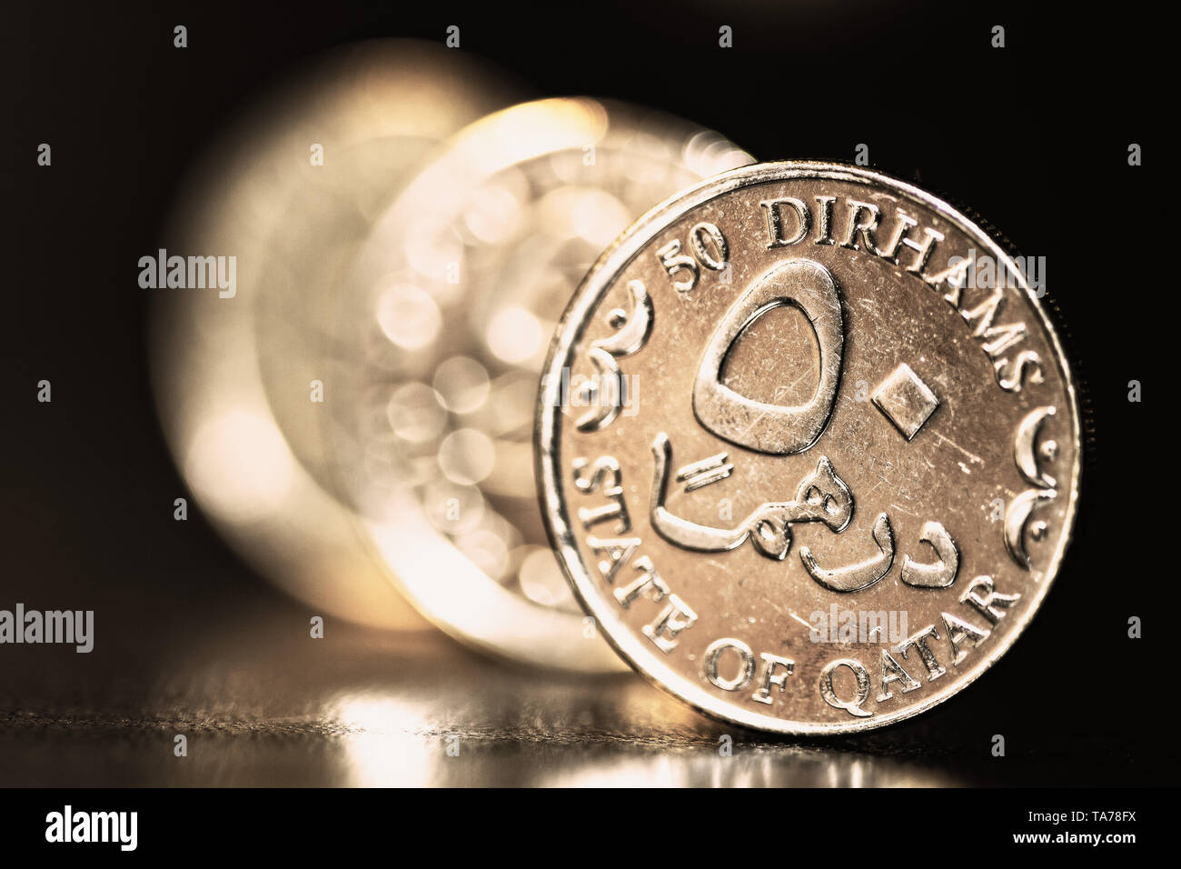 Qatar coins art macro shoot Stock Photo - Alamy