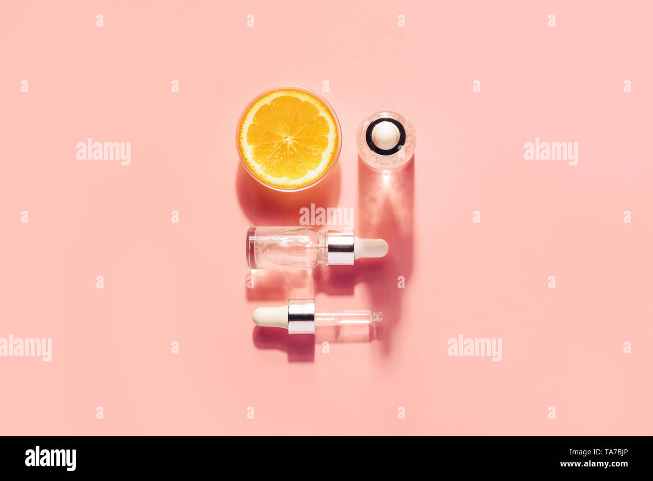 Serum with vitamin C, concept design. Beauty therapy, body care. Flat lay. Stock Photo