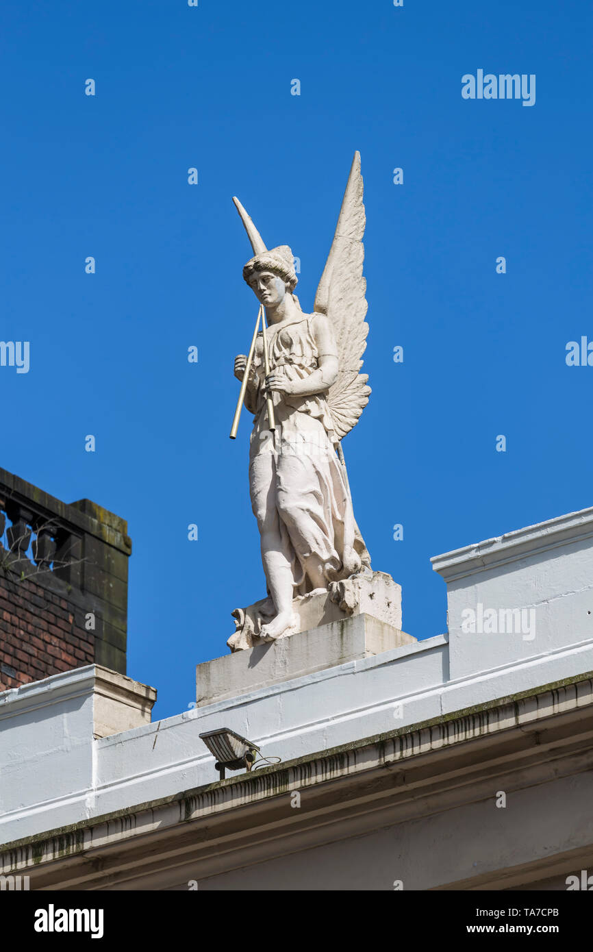 The angel statue Harmony by sculptor James Alexander Ewing above