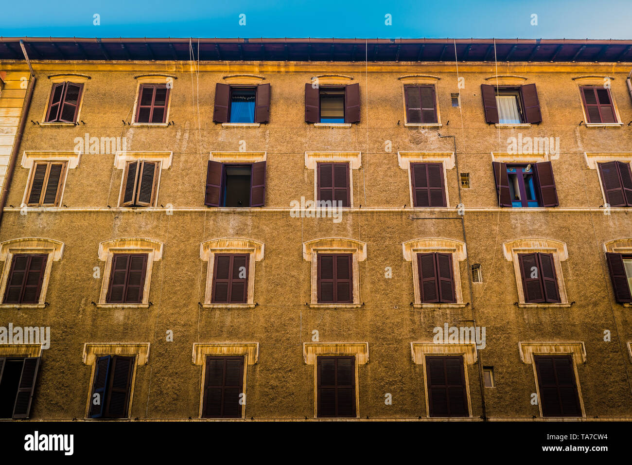 Photograph of a Rome facade hotel, highlighting its windows Stock Photo