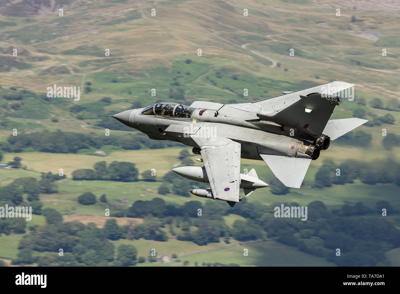 RAF Panavia Tornado GR4 jet flying low level through the Mach Loop, Wales, UK Stock Photo