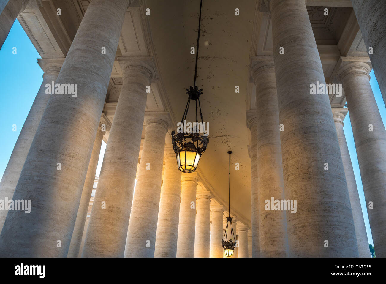 Old luminaire between the Doric Colonnade, Vatican Stock Photo