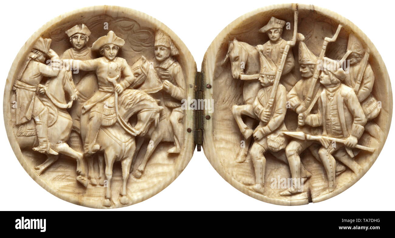 A German spherical carving made of ivory depicting "Old Fritz", circa 1880 Massive ivory ball that unfolds in the middle, with brass hinge, the inside with fine carving in relief. On the right depiction of Frederick II on horseback amidst his generals, the left with advancing grenadiers with non-commissioned officer and mounted officer. Diameter 5.7 cm. historic, historical, Prussian, Prussia, German, Germany, militaria, military, object, objects, stills, clipping, clippings, cut out, cut-out, cut-outs, 19th century, Additional-Rights-Clearance-Info-Not-Available Stock Photo