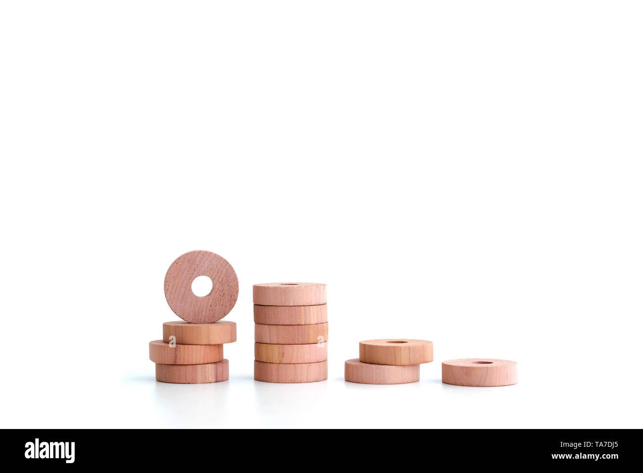 Wooden round cedar rings for hangers for moth protection isolated on