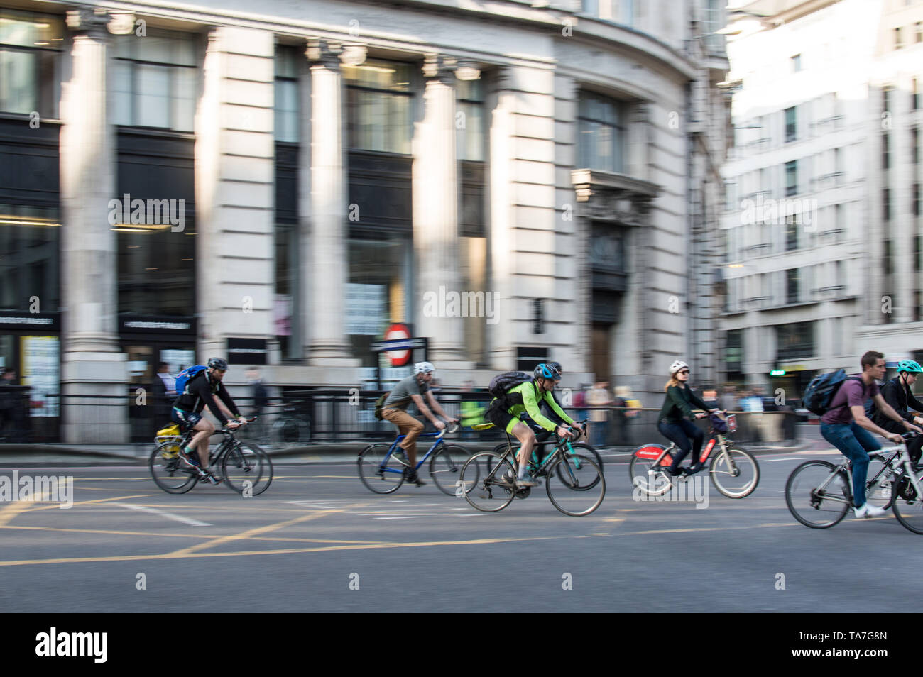 Cyclist (Motion Blur) in London City junction Stock Photo