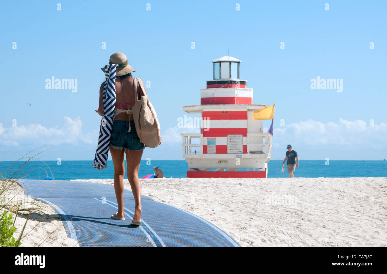 Woman Walking to the Beach, South Beach, Miami Beach, Florida Stock Photo