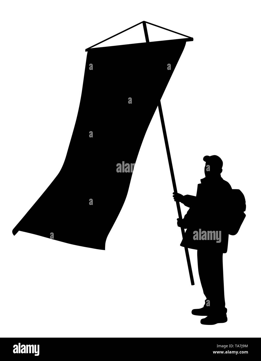 Man holding a large vertical medieval flag Stock Photo