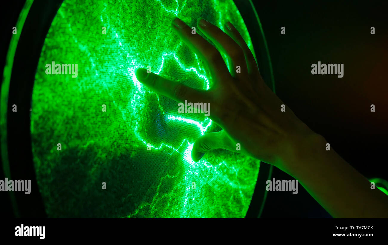 Plasma ball green hand hi-res stock photography and images - Alamy