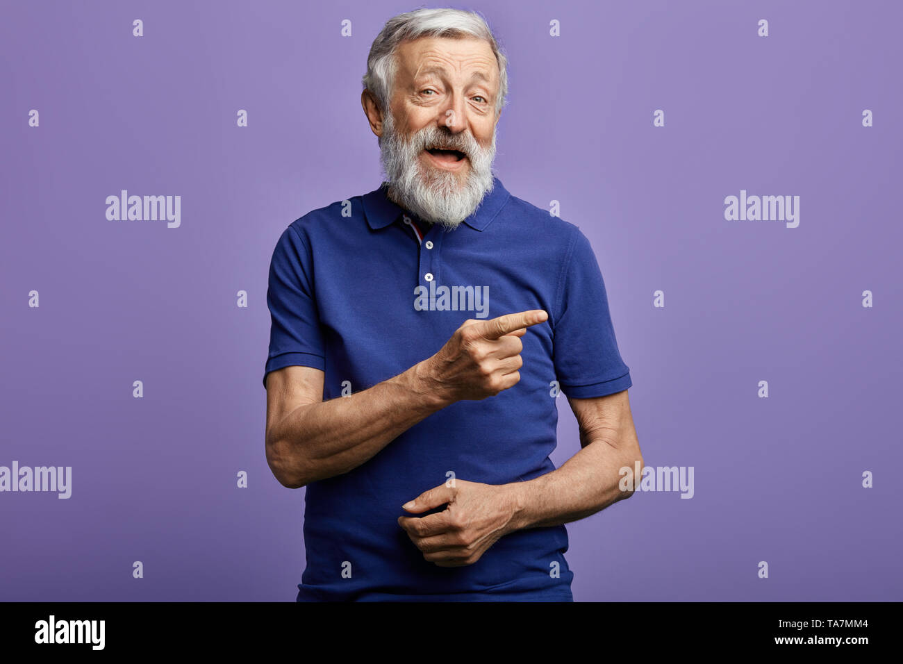 Old man pointing mouth hi-res stock photography and images - Alamy
