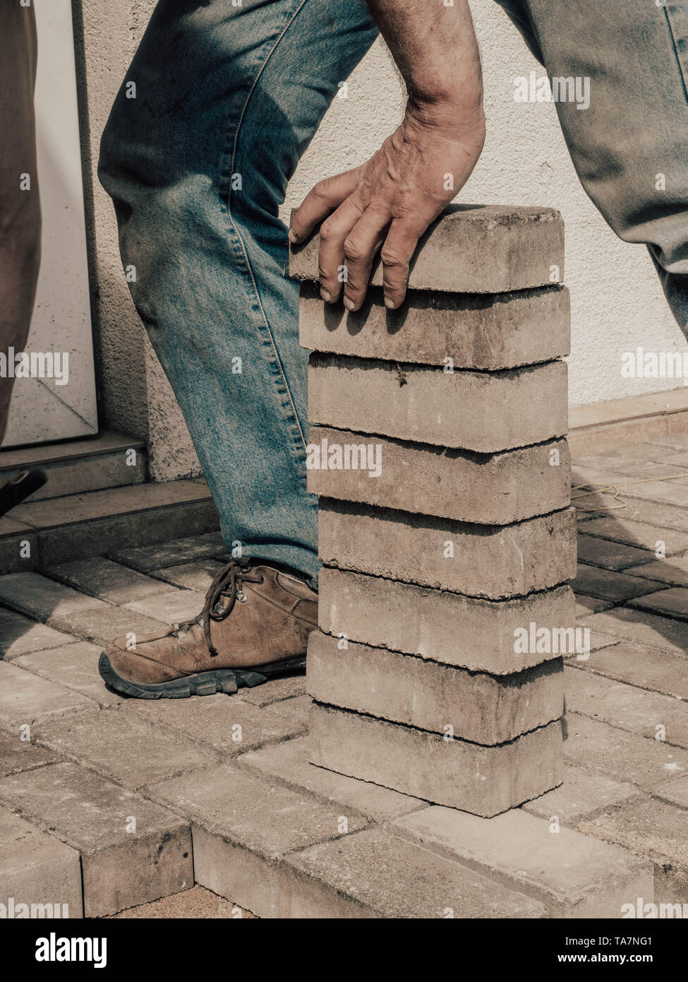 can you lay patio slabs on sand