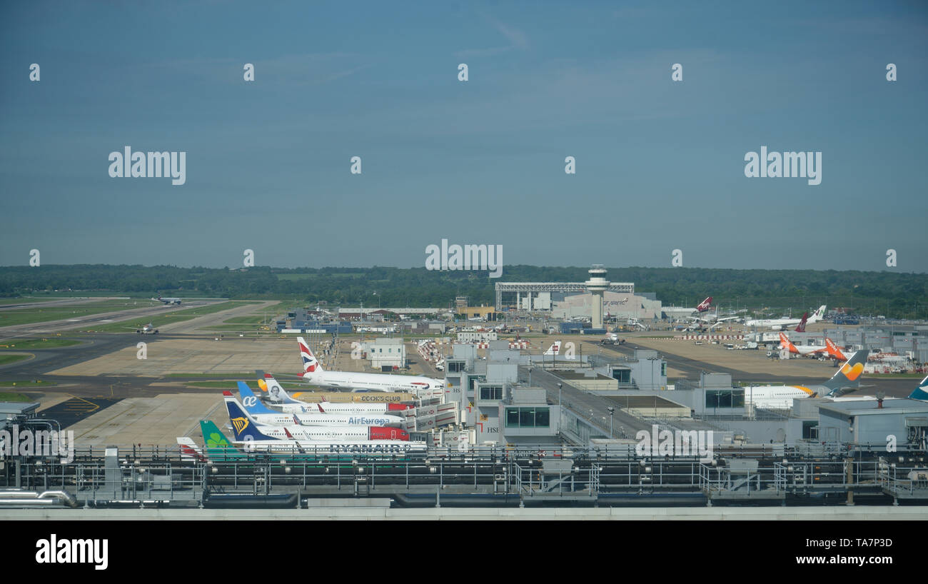 Gatwick airport terminal buildings and aircraft at stands. Stock Photo