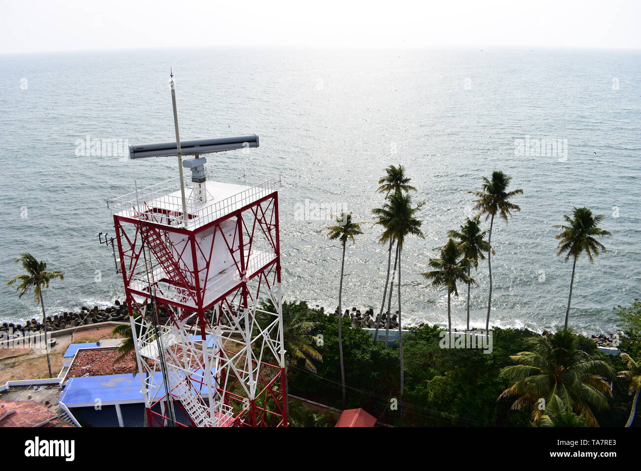 Kollam, Kerala, India: March 2, 2019 - Tangasseri Lighthouse and Fishing Harbour Stock Photo