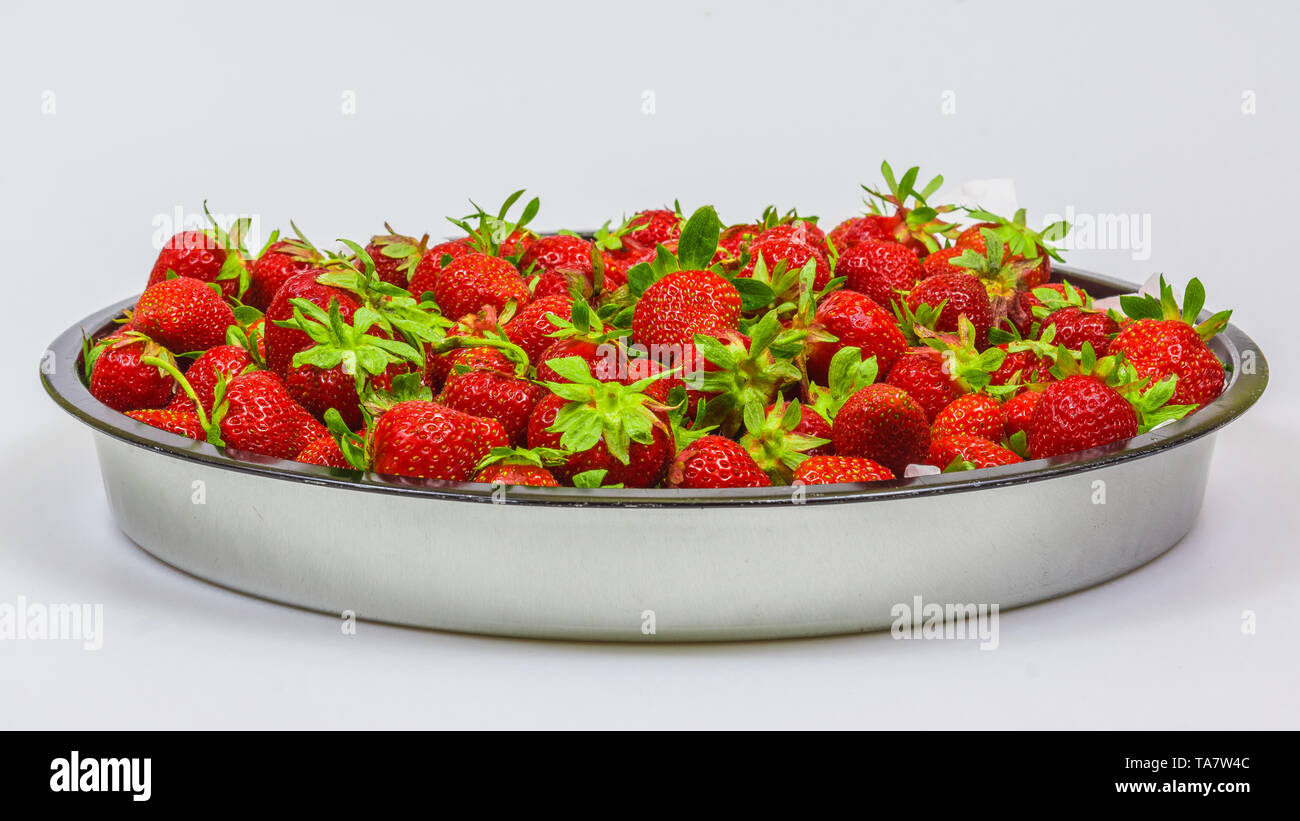 Fresh strawberries in bowl isolated on white background Stock Photo - Alamy