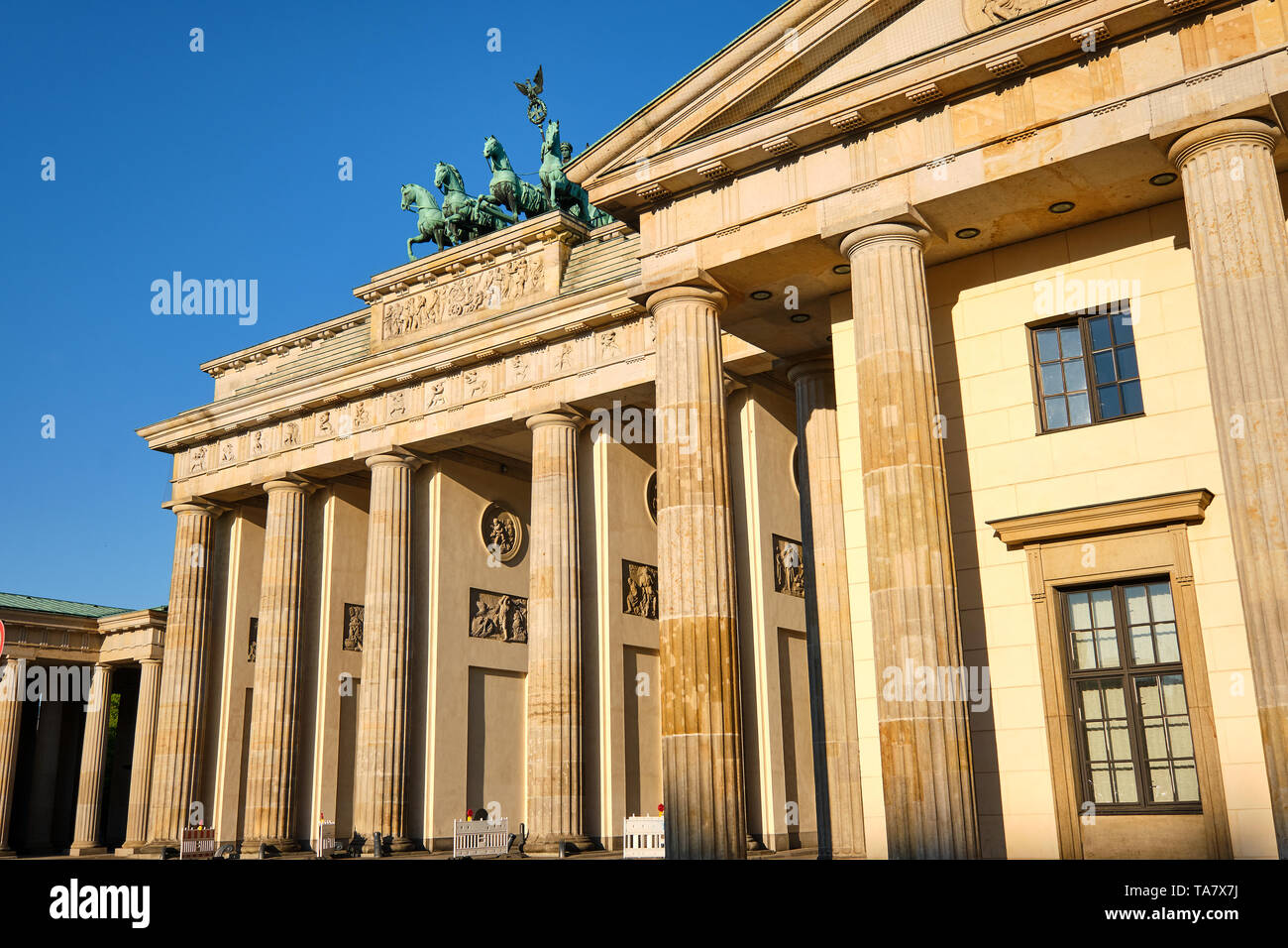 The famous Brandenburg Gate in Berlin after sunrise Stock Photo