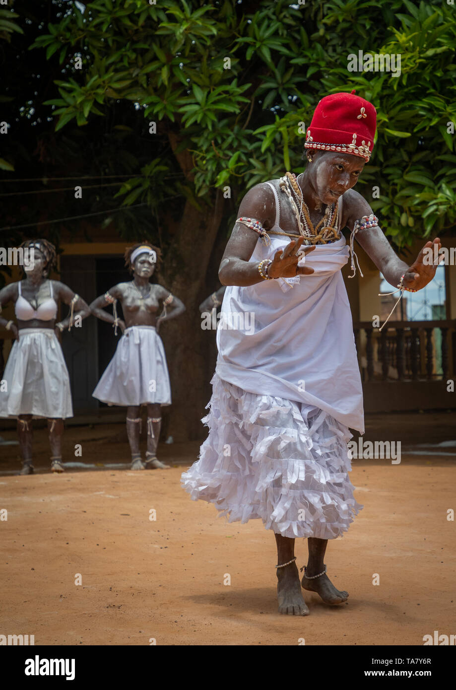 Women dancing during a ceremony in Adjoua Messouma Komians initiation centre, Moyen-Comoé, Aniassue, Ivory Coast Stock Photo