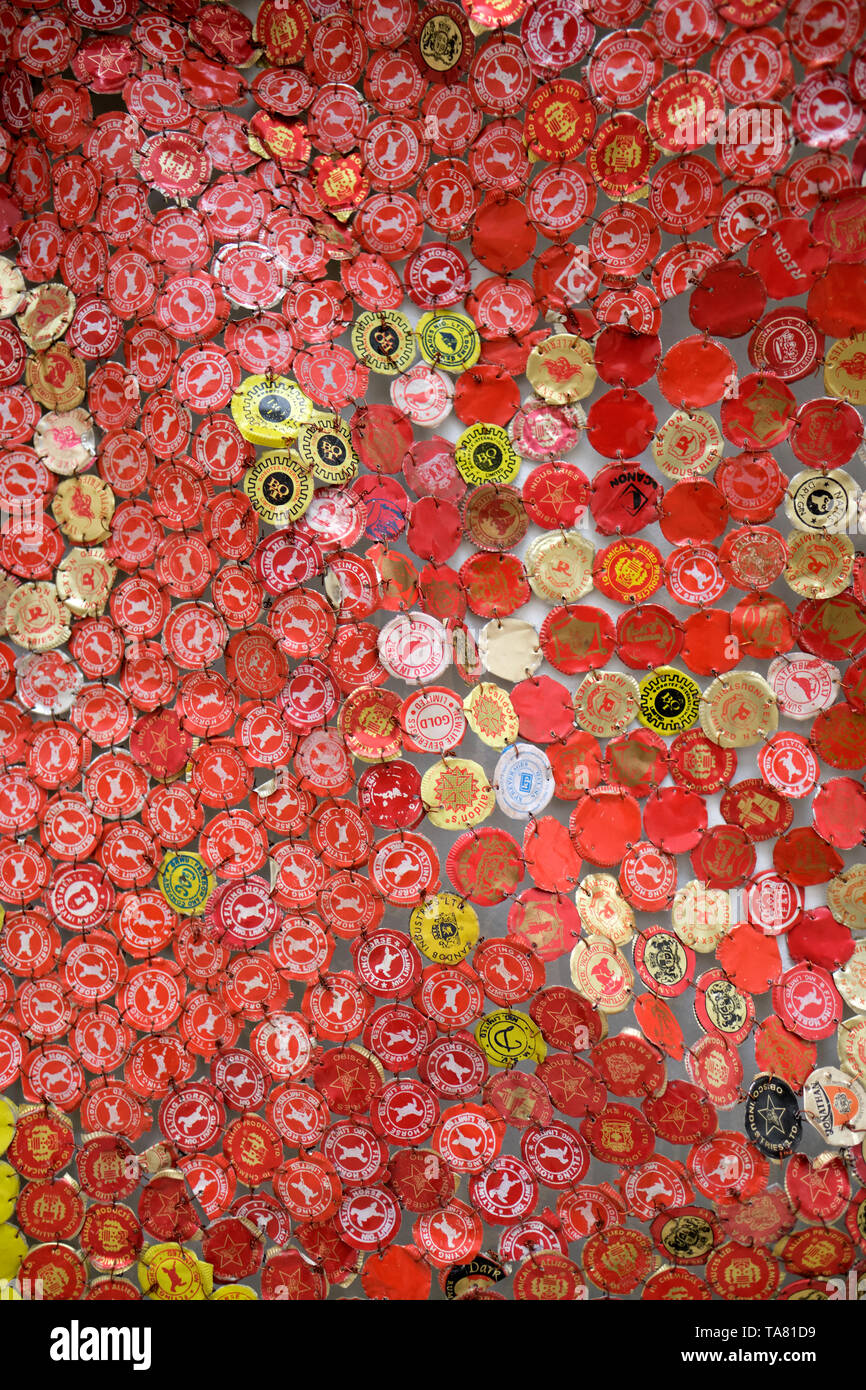 Artwork detail of El Anatsui a Ghanaian artist who creates metallic  cloth-like wall sculptures out of recycled bottle waste - Haus der Kunst  Munich EU Stock Photo - Alamy