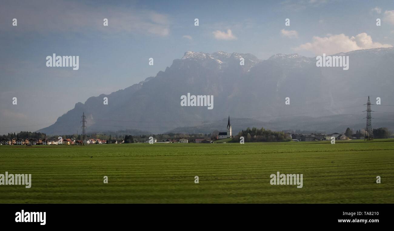 Snow disappearing in Austrian alps in the spring Stock Photo