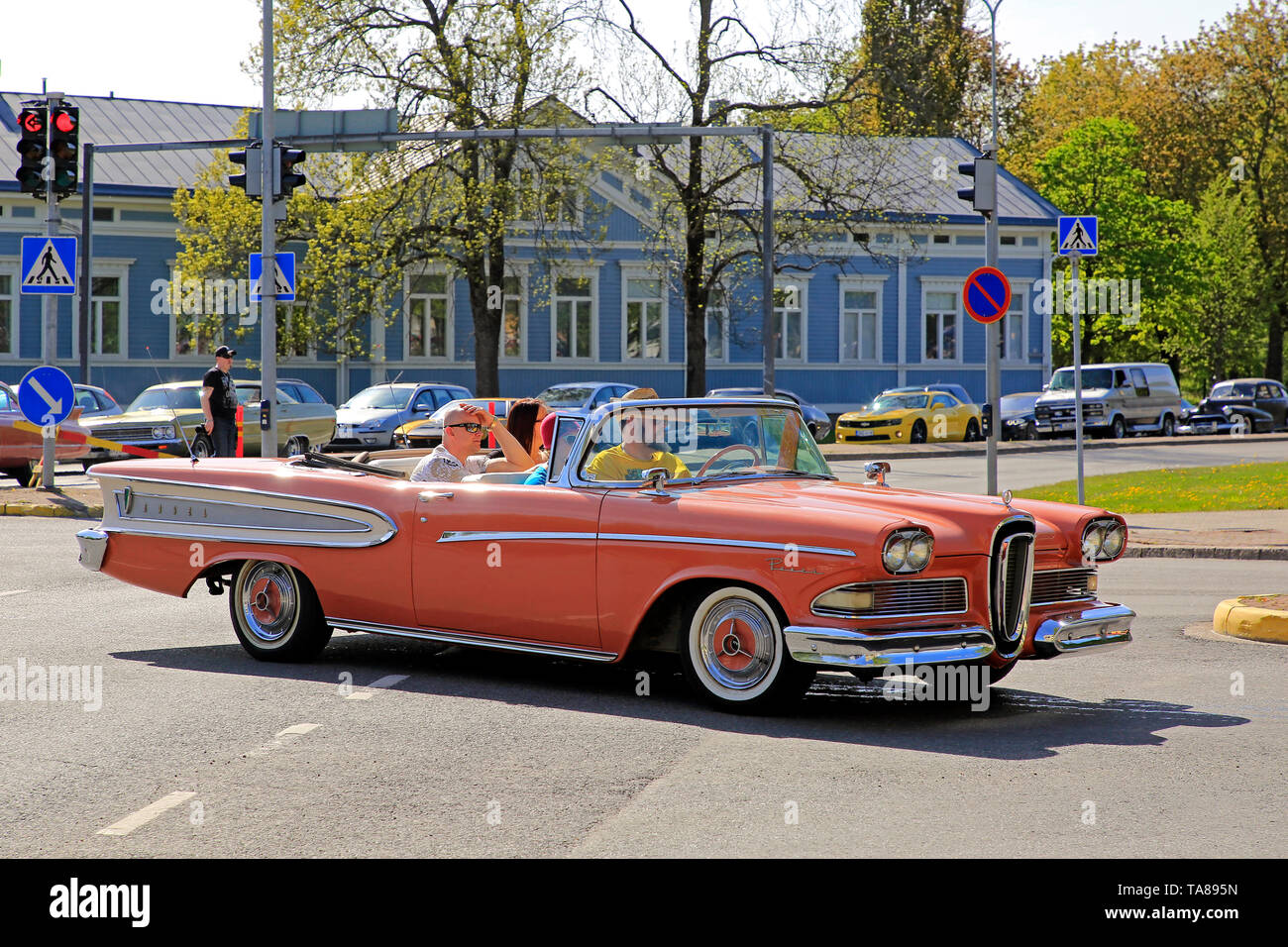 Salo, Finland. May 18, 2019. Orange Edsel Pacer 1958 and other ca 450 vintage cars participating in Salon Maisema Cruising 2019 line up in city traffi Stock Photo