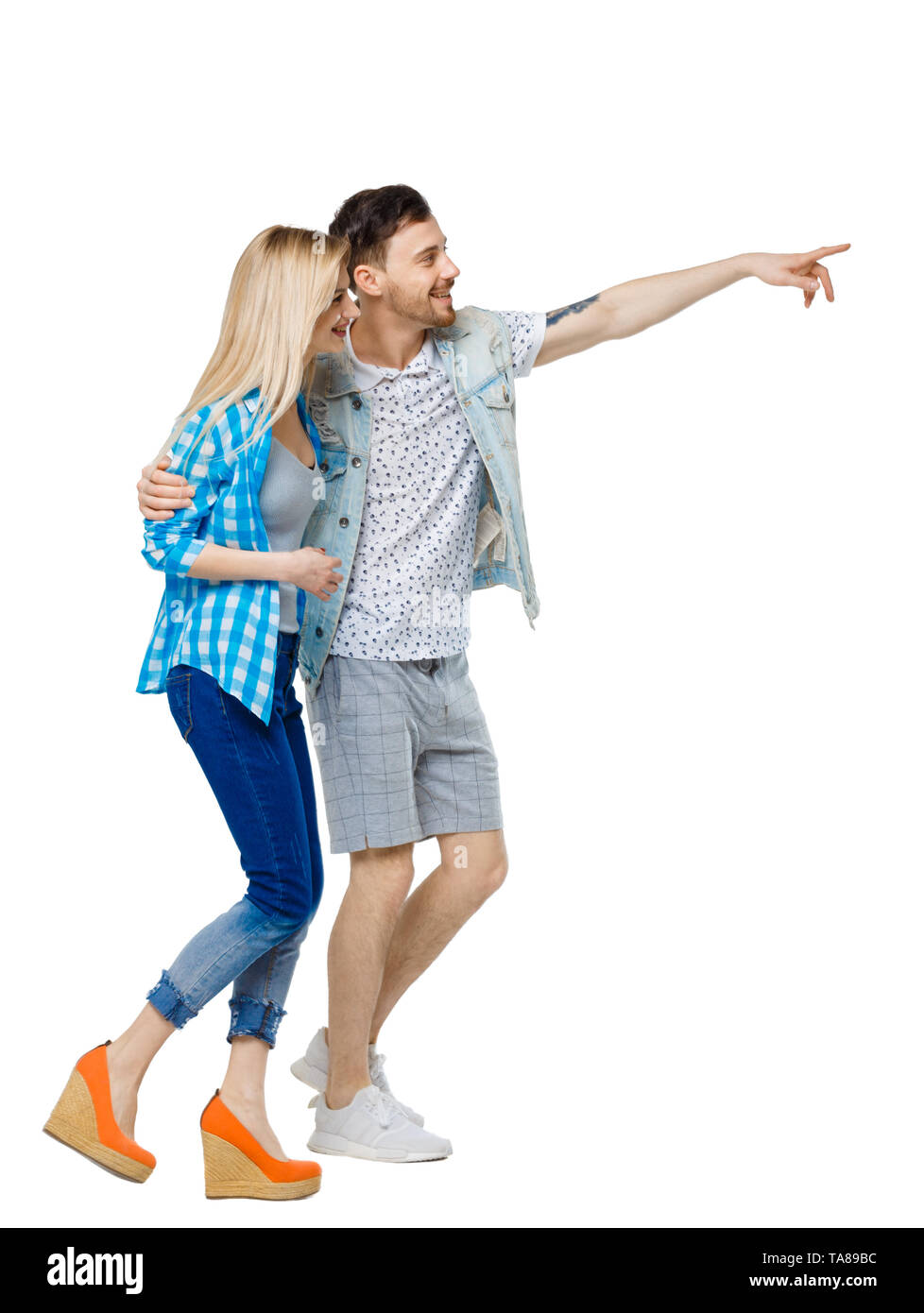 Side view of the couple walking and pointing upwards. Rear view people  collection. backside view of person. Isolated over white background. The  guy an Stock Photo - Alamy, image size:978x1390