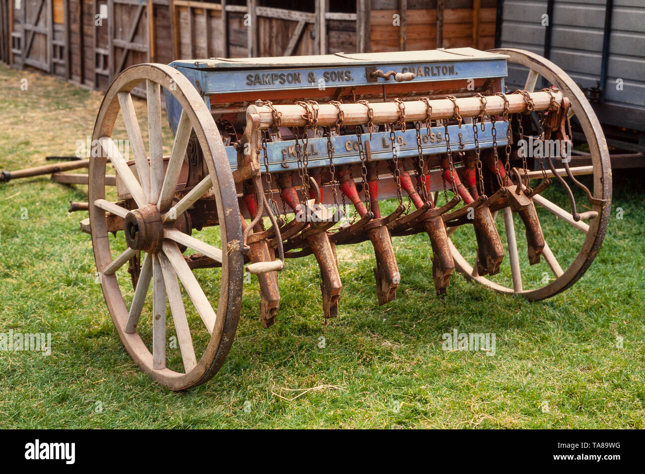 Early agricultural farming sowing machine, drill seed sowing machine, pulled by horse Stock Photo
