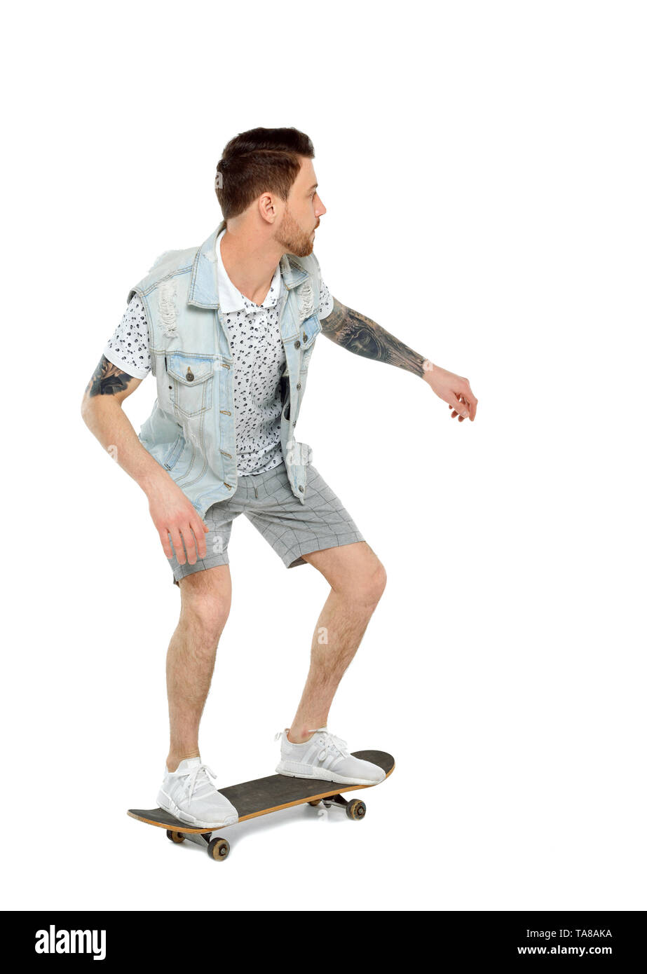 Back view of a man with a skateboard. Rear view people collection. backside  view of person. Isolated over white background. Tattooed skater rides Stock  Photo - Alamy