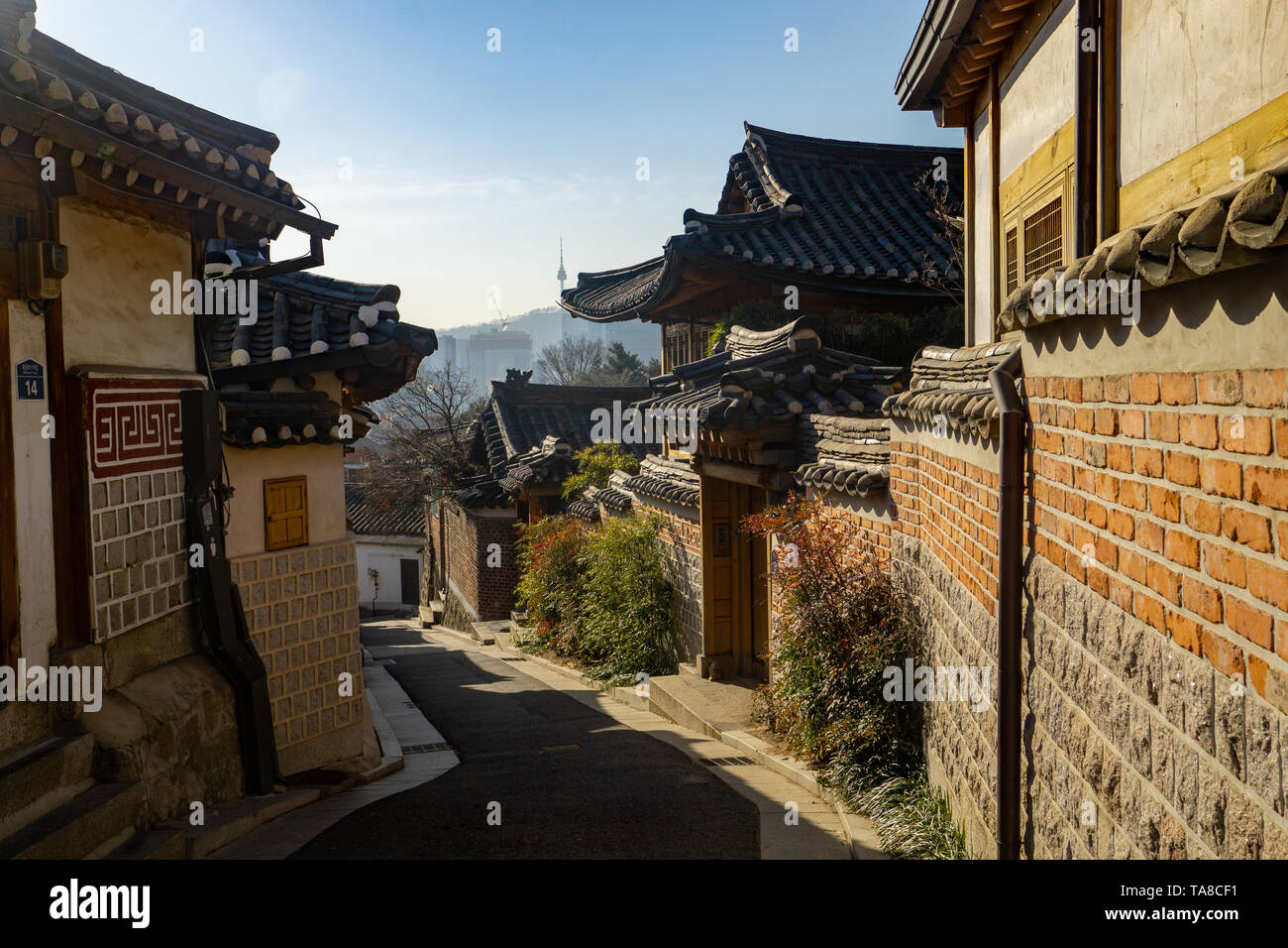 Traditional Korean houses called 'hanok' line the streets of Bukchon Hanok Village in Seoul, South Korea Stock Photo
