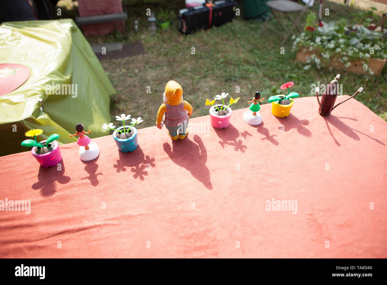 Rear View of Table Top Miniature Toys at Outdoor Event Stock Photo