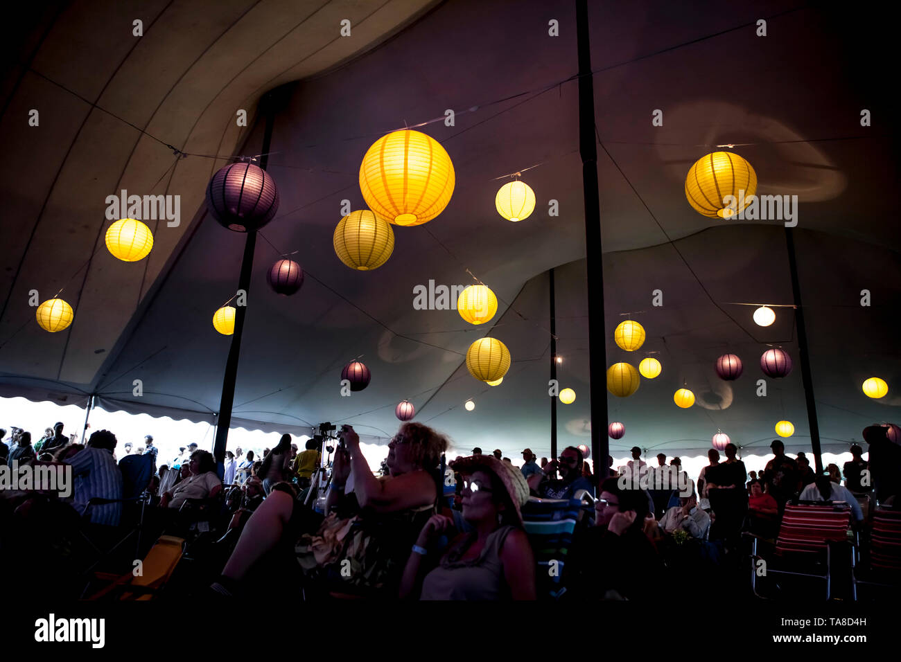Globe Lights under Tent with Audience at Music Festival, Rhythm and Roots Music Festival, Rhode