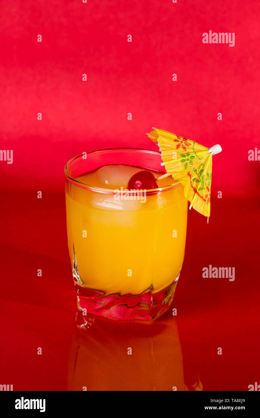 Vodka and Orange juice mixed drink with a cocktail umbrella Stock Photo Alamy