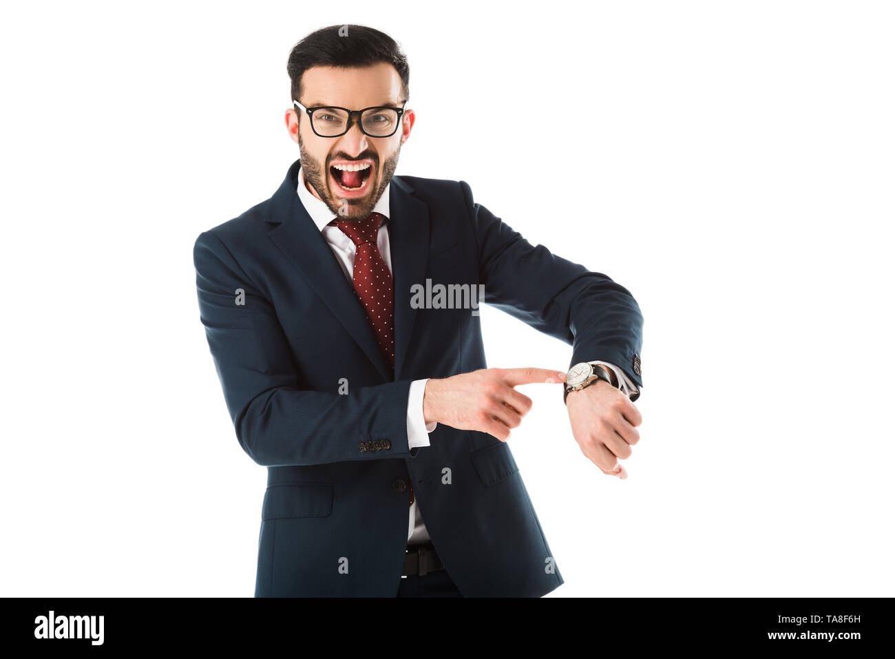 angry businessman quarreling while looking at camera and pointing at watch isolated on white Stock Photo