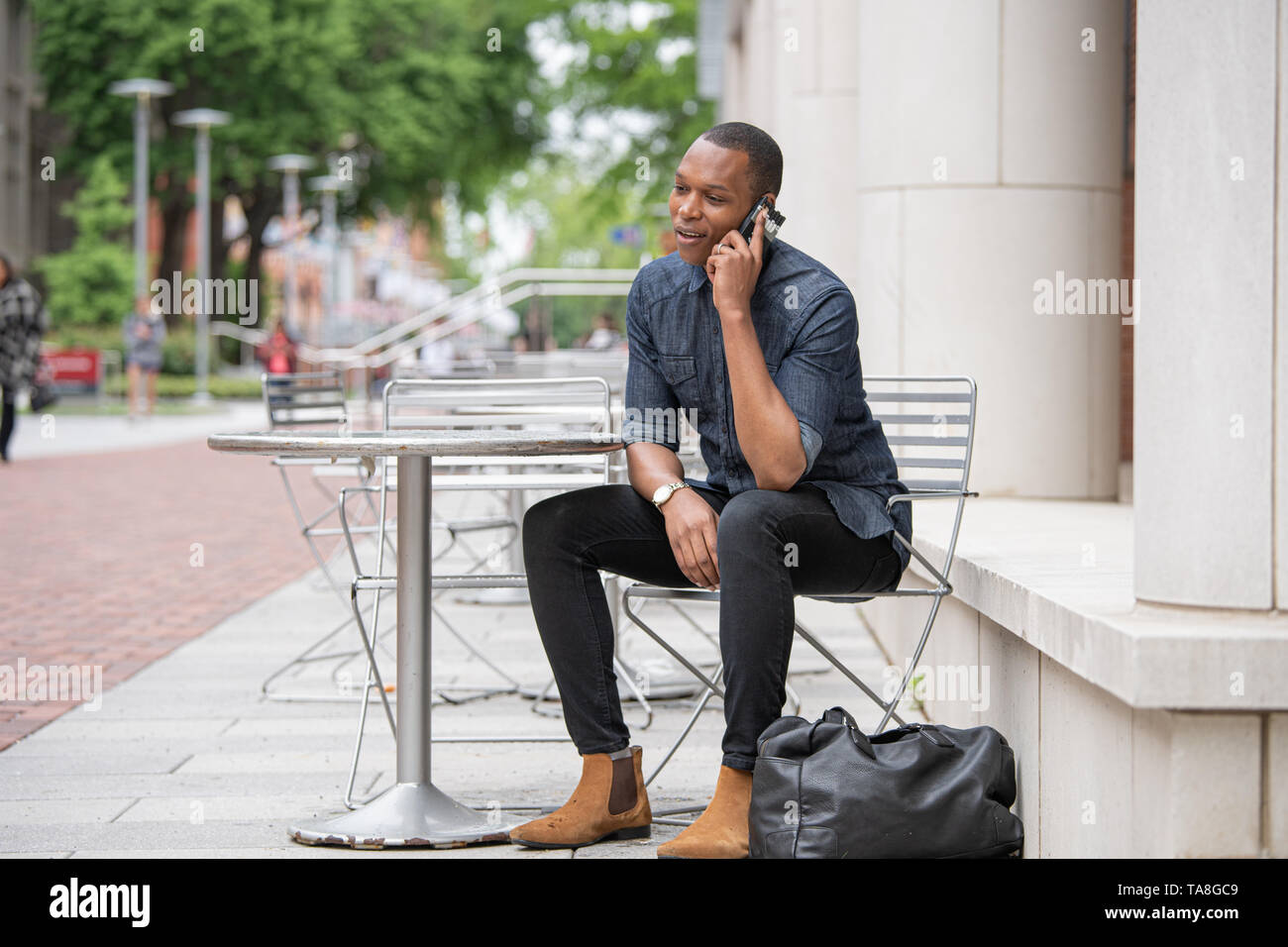 African american man in denim shirt hi-res stock photography and images ...