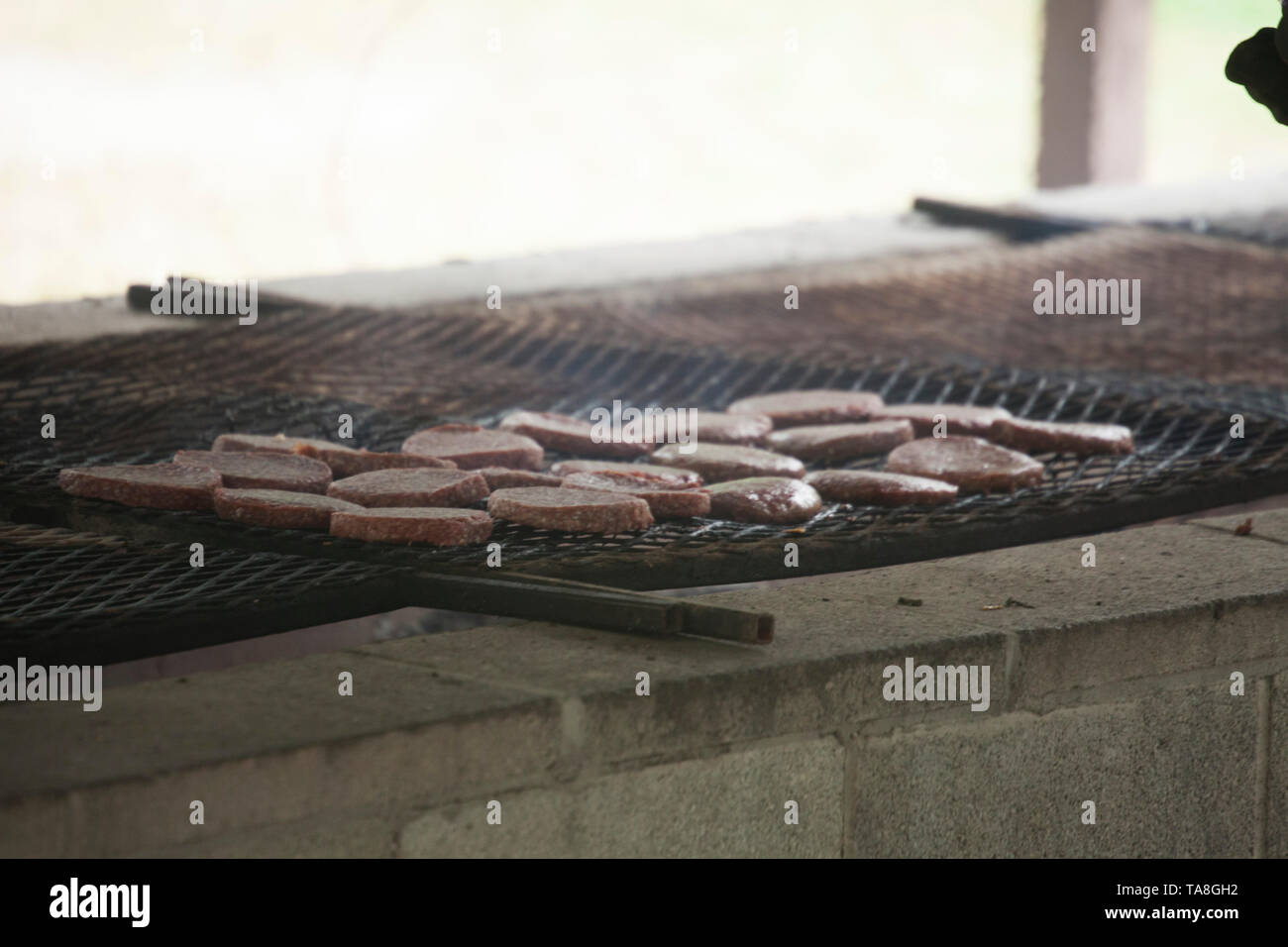 Hamburgers on Grill Stock Photo