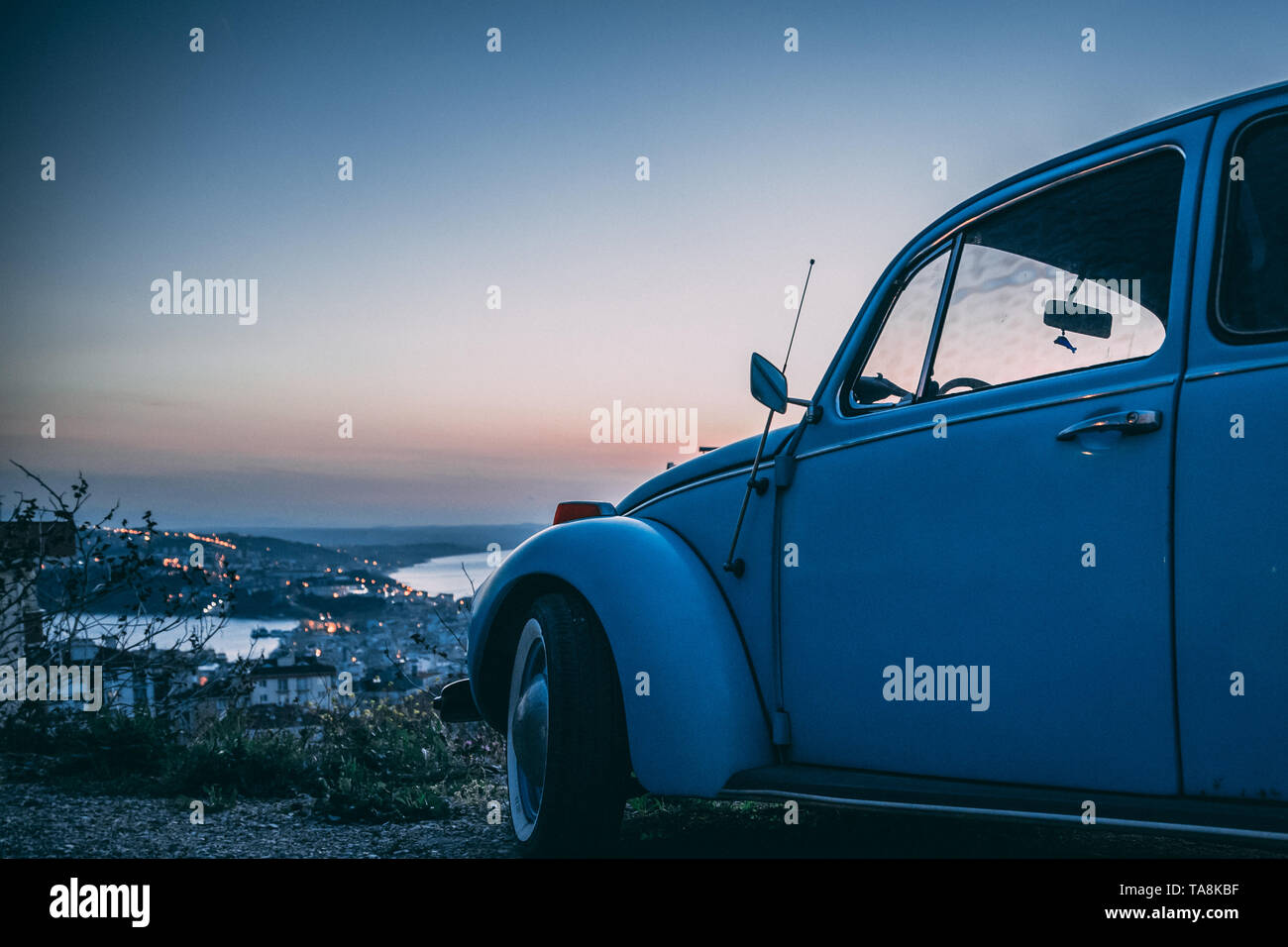 vintage beetle car at sunset, to make a road trip millennial Stock ...