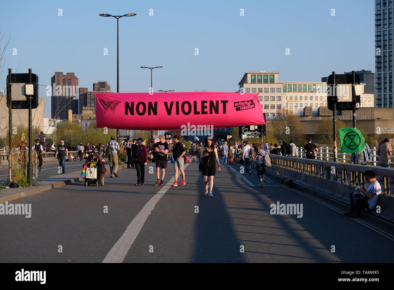 Extinction Rebellion 'Non Violent' banner stretched across activist occupied Waterloo Bridge during sixth day of protest Stock Photo
