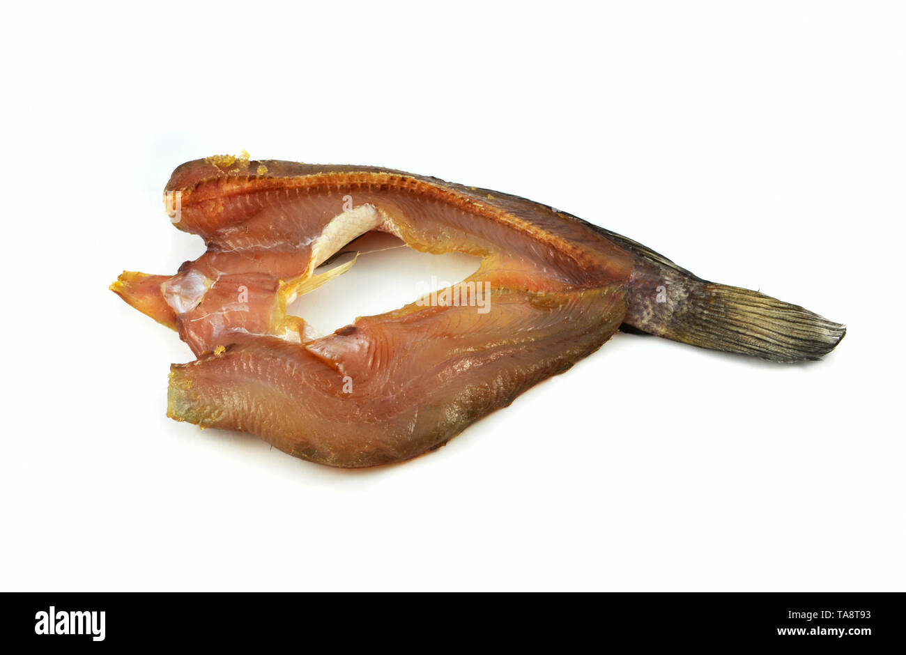 Dry striped snakehead fish sun dried isolated on white background / freshwater fish dissect preserve dry food Stock Photo