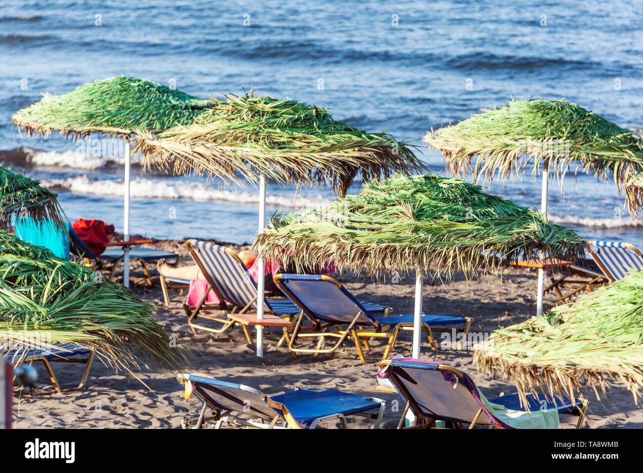 Santorini Beach, Umbrellas at Monolithos Beach Greek Islands, Greece, Europe Stock Photo