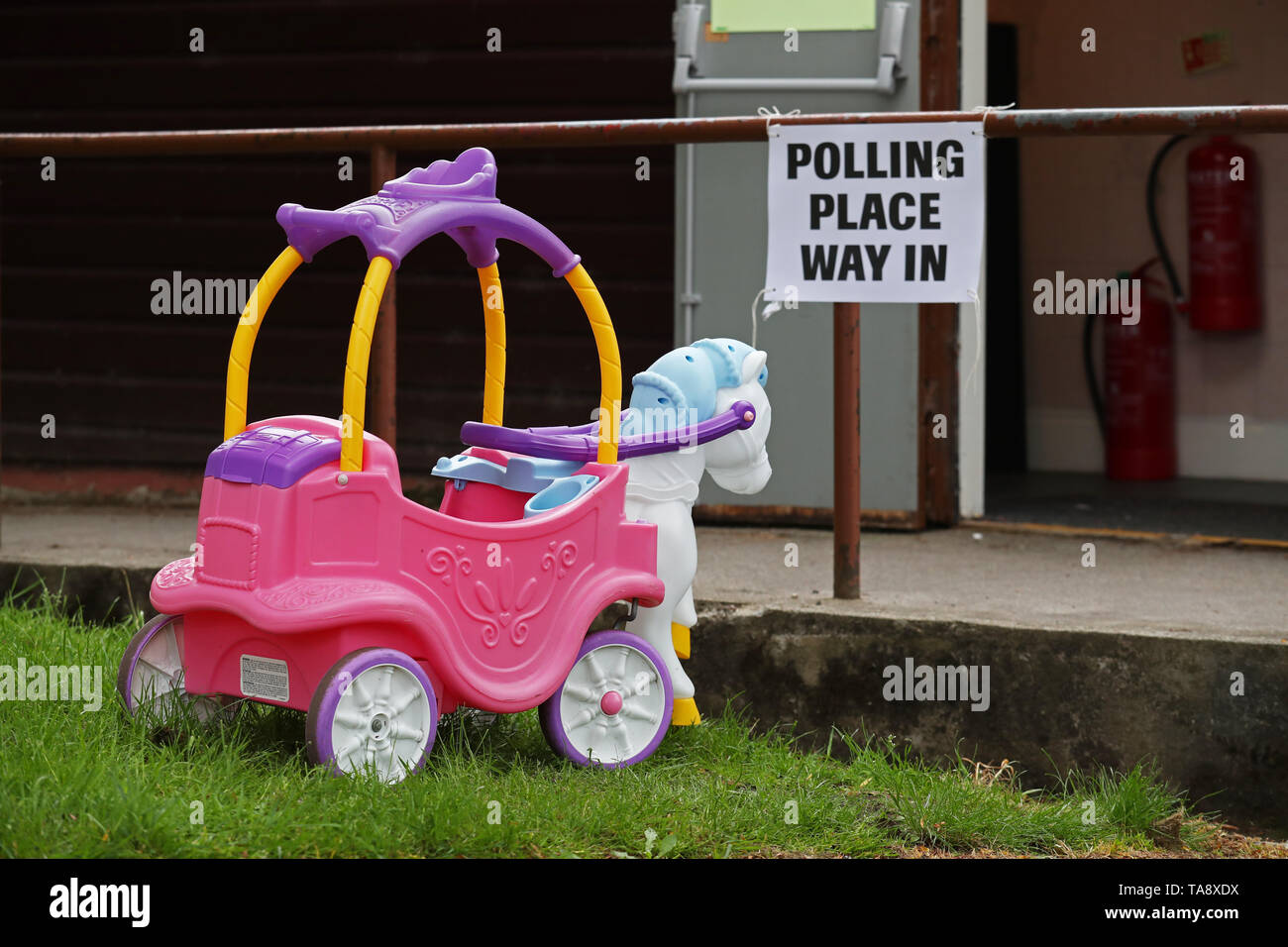 A child's toy sits outside a polling station in Broomhouse Park Community Hall in Edinburgh as the electorate head to the polls for the European Parliament election. Stock Photo