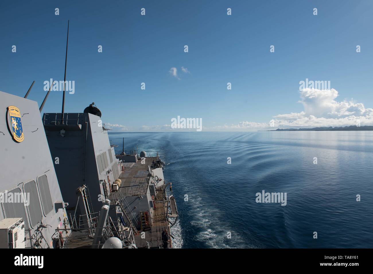 190515-N-OW019-1014 PALAU (May 15, 2019) The guided-missile destroyer USS Chung-Hoon (DDG 93) sails towards Palau to conduct a port visit. Chung-Hoon is deployed to the U.S. 7th Fleet area of operations in support of security and stability in the Indo-Pacific region. (U.S. Navy photo by Mass Communication Specialist 2nd Class Logan C. Kellums) Stock Photo