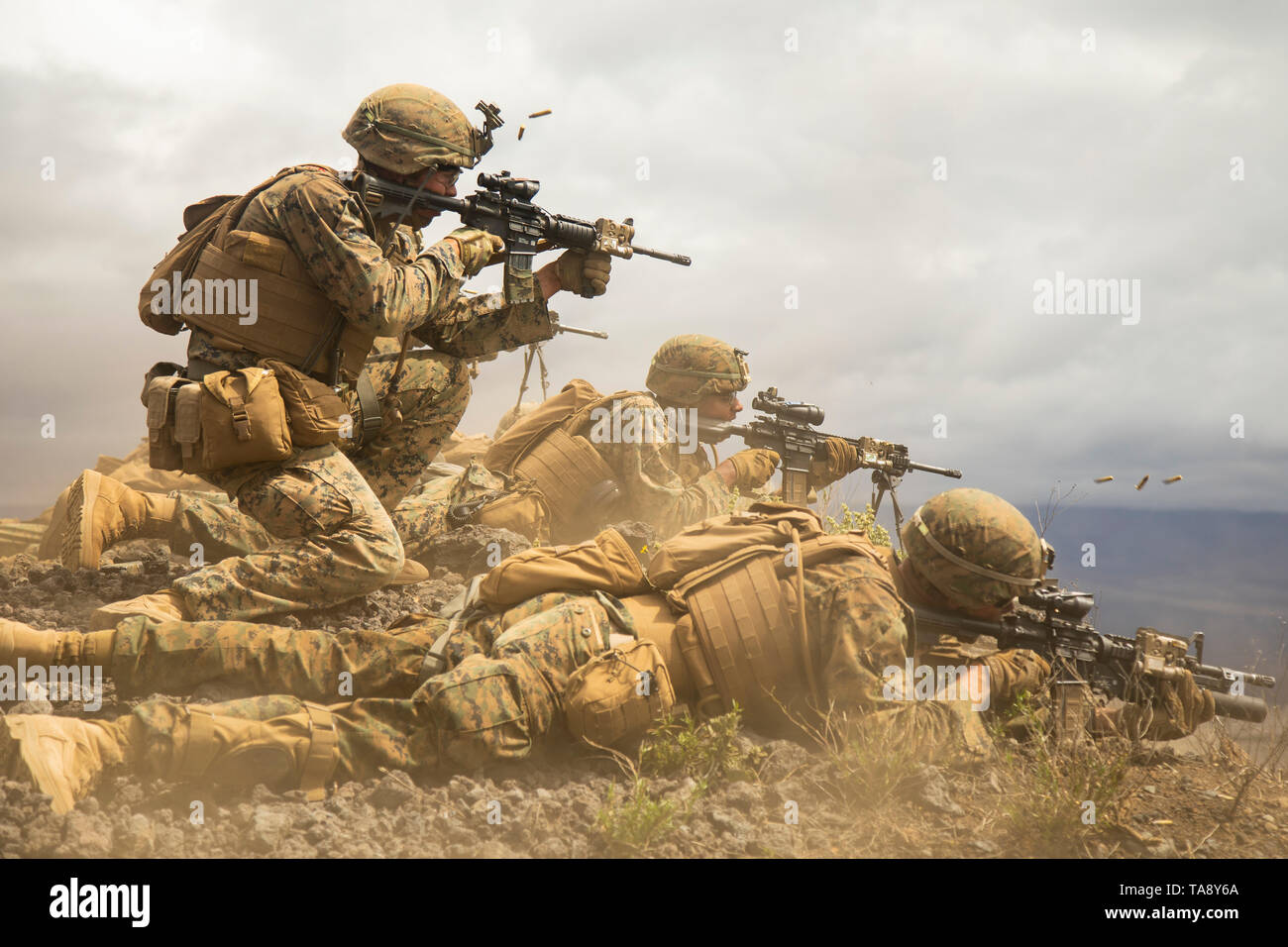 U.S. Marines with Golf Company, 2nd Battalion, 3d Marine Regiment, fire at targets during a platoon supported attack at Pōhakuloa Training Area, May 9, 2019. Exercise Bougainville II is the second phase of predeployment training conducted by the battalion in order to enhance unit cohesion and combat readiness. (U.S. Marine Corps photo by Cpl. Brendan Custer) Stock Photo